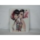 Coque Etui brillante motif "manga" jumelle tatouage tete de mort pour Ipad 1 + film protection ecran offert