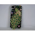 Coque rigide et brillante motif paon en strass vertes pour Iphone 4 + film protection ecran